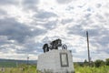 Monument of industrialization. Monument to the first tractor in the city of Causeni, Moldova. National treasure of Moldova
