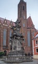 Monument of John of Nepomuk and church of the Holy Cross in WrocÃâaw Royalty Free Stock Photo