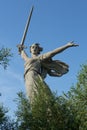 The monument Motherland Calls at the Mamayev Kurgan War Memorial in Volgograd, Russia. Clear blue sky. It is the tallest statue in Royalty Free Stock Photo