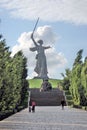 Monument Motherland in Volgograd, people walking by.