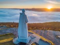 Aerial view of Defenders of the Soviet Arctic monument Alyosha in Murmansk on a foggy day