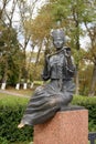 Monument of muse in the image of the Vologda peasant girl with a pipe. Royalty Free Stock Photo