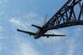 Low point of view of the war plane monument over clouds in a blue sky Royalty Free Stock Photo