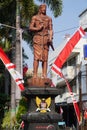 The monument of Panji Asmoro Bangun in Kediri. The statue holding lotus flower and keris keris is one of traditional Javanese wea