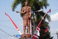 The monument of Panji Asmoro Bangun in Kediri. The statue holding lotus flower and keris keris is one of traditional Javanese wea