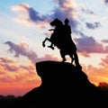 Monument of Peter Great, silhouette against the sunset. St. Pete