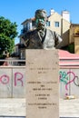 monument representing the Brazilian writer Machado de Assis vandalized with paint in the city of Lisbon.