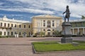 Monument of russian emperor and classical palace Royalty Free Stock Photo