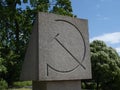 Monument with a sickle and hammer Royalty Free Stock Photo