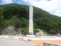 Monument of soyang dame with green mountains and bluse sky in the background