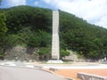 Monument of soyang dame with green mountains and bluse sky in the background