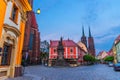 Cathedral of St. John the Baptist building with two spires in old historical city centre, evening view, Ostrow Tumski, Wroclaw Royalty Free Stock Photo