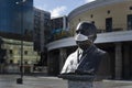 Monument statue in Mercado Modelo square with protective mask on face