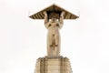 a monument to the Aircraft Builders on Glory Square. The worker on the arms raised up holds large inclined planes, symbolizing th