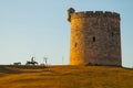 Monument to don Quixote and Sancho Panza at the tower of the fortress in the evening. Varadero. Cuba