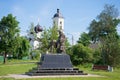 The monument to F. M. Dostoevsky at the St. Nicholas Church on a june day. Staraya Russa, Russia