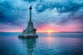 Monument to the flooded ships against the backdrop of the beautiful cloudy sunset. Sevastopol, Crimea Royalty Free Stock Photo