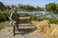 Monument to the former US President Ronald Reagan sitting on a bench in the Ricke Park. Tbilisi, Georgia Royalty Free Stock Photo