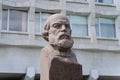 A granite monument to Ilya Ulyanov, father of LENIN, roughly carved from a block