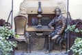 A monument to inventors of a kerosene lamp, Ignaty Lukasevich and Jan Zag in a street cafe, Lviv, Ukraine. Close up
