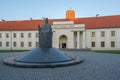 Monument to King Mindaugas in front of New Arsenal of National Museum of Lithuania and Gediminas Castle Tower - Vilnius, Lithuania Royalty Free Stock Photo