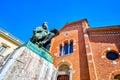 The monument to Mose Bianchi at the facade of Chiesa di San Pietro Martire church in Monza, Italy