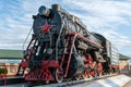 Monument to the old steam locomotive. Such steam locomotives were used in the first half of the 20th century, in the Soviet Union Royalty Free Stock Photo