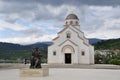 Monument to Petar II Petrovich Njegosh is installed on the square in front of the church of St. Prince Lazarus Royalty Free Stock Photo