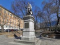 The monument to Sergey Lazo in the background of the urban landscape Royalty Free Stock Photo