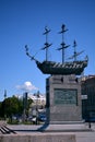 A monument to a ship on a pedestal in St. Petersburg