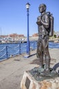 Monument to Standby dives or monument to scuba diver at the marina in Simons Town