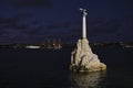 The Monument to the Sunken Ships in Sevastopol Bay, illuminated in the evening. The symbol of the city of Sevastopol, on the