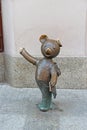 Monument to teddy bear made of bronze. Little bear sculpture