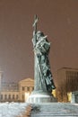 Monument to Vladimir the Great on Borovitskaya Square cold snowy winter night.