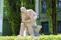 A monument to Vladimir Ilyich Lenin with a boy in his arms.