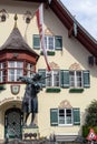 Monument to young Mozart at the building of the town hall of St. Gilgen, Austria