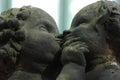 A closeup photo with statue of two angels kissing each others seen in Dresden, Germany Royalty Free Stock Photo