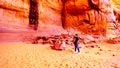 A Navajo woman singing a traditional song in the Big Hogan cave to demonstrate the acoustics in the cave in Monument Valley