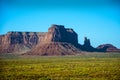 Monument Valley provides perhaps the most enduring and definitive images of the American West. The isolated red mesas and buttes a Royalty Free Stock Photo