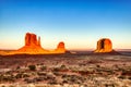 Monument Valley in Navajo National Park Illuminated by Sunset, Border of Utah and Arizona Royalty Free Stock Photo