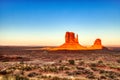 Monument Valley in Navajo National Park Illuminated by Sunset, Border of Utah and Arizona Royalty Free Stock Photo