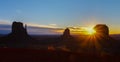 Monument Valley at sunrise with iconic West and East Mitten Buttes, Arizona USA Royalty Free Stock Photo