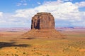 The Monument Valley in UtahÃ¢â¬âArizona state with the red earth desert in the foreground Royalty Free Stock Photo