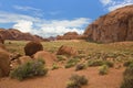 The Monument Valley in Utah Arizona state with the red earth desert and rock in the background that looks like a sleeping dragon Royalty Free Stock Photo