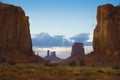 The Monument Valley in UtahÃ¢â¬âArizona state with the red earth desert at sunset Royalty Free Stock Photo