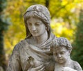 Monument of the woman with the child on a cemetery Royalty Free Stock Photo