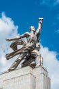 Monument Worker and collective farm girl against blue sky on VDNH in Moscow