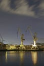 Monumental Cranes at sunrise in Shipyard. Royalty Free Stock Photo