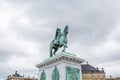 A monumental equestrian statue of Amalienborg`s founder, King Frederick V. in the Amalienborg, the home of the Danish royal