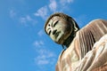 Monumental outdoor bronze statue of Amida Buddha which is most famous of Japan Royalty Free Stock Photo